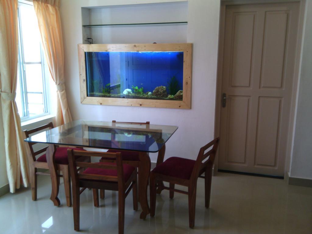 Nathans Holiday Home Коччи Номер фото